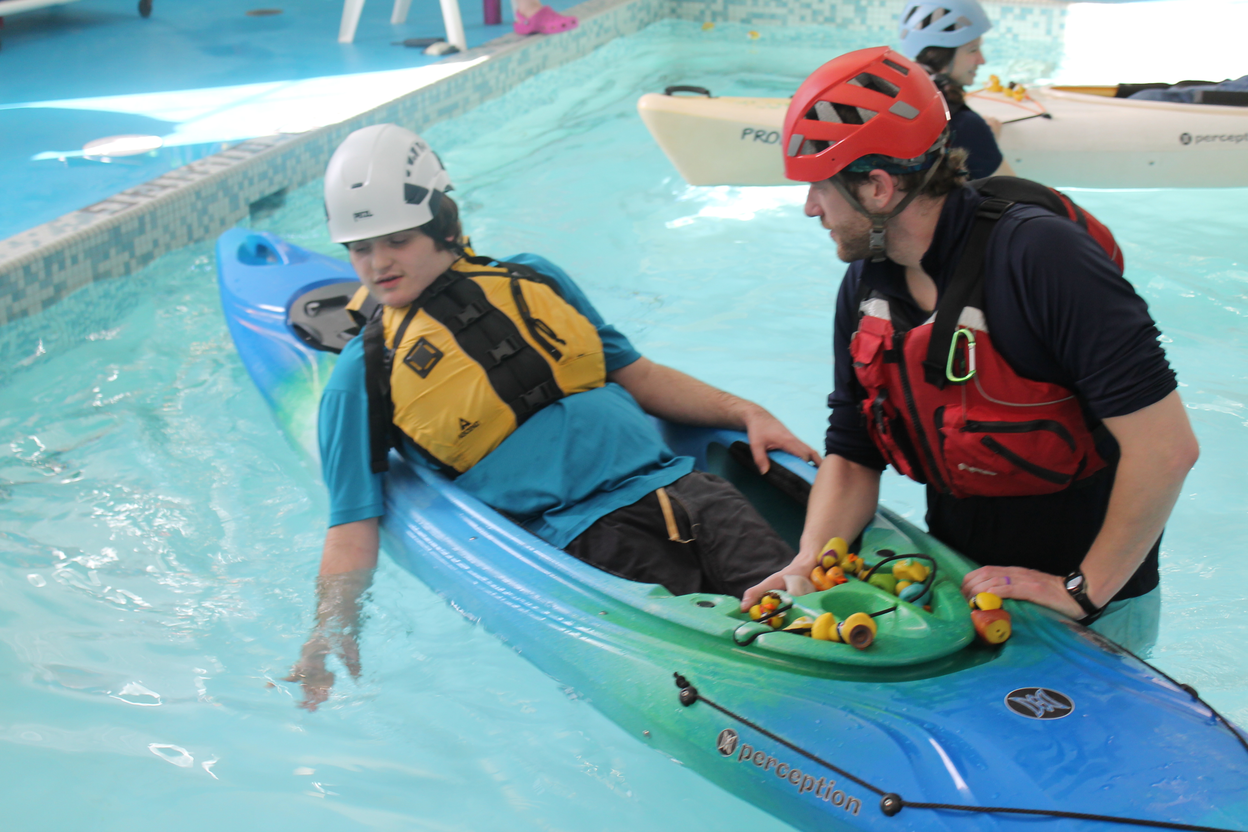 Smiling participants in an arthritis class at Sunshine Communities’ pool, demonstrating strength and mobility through guided water-based movement.