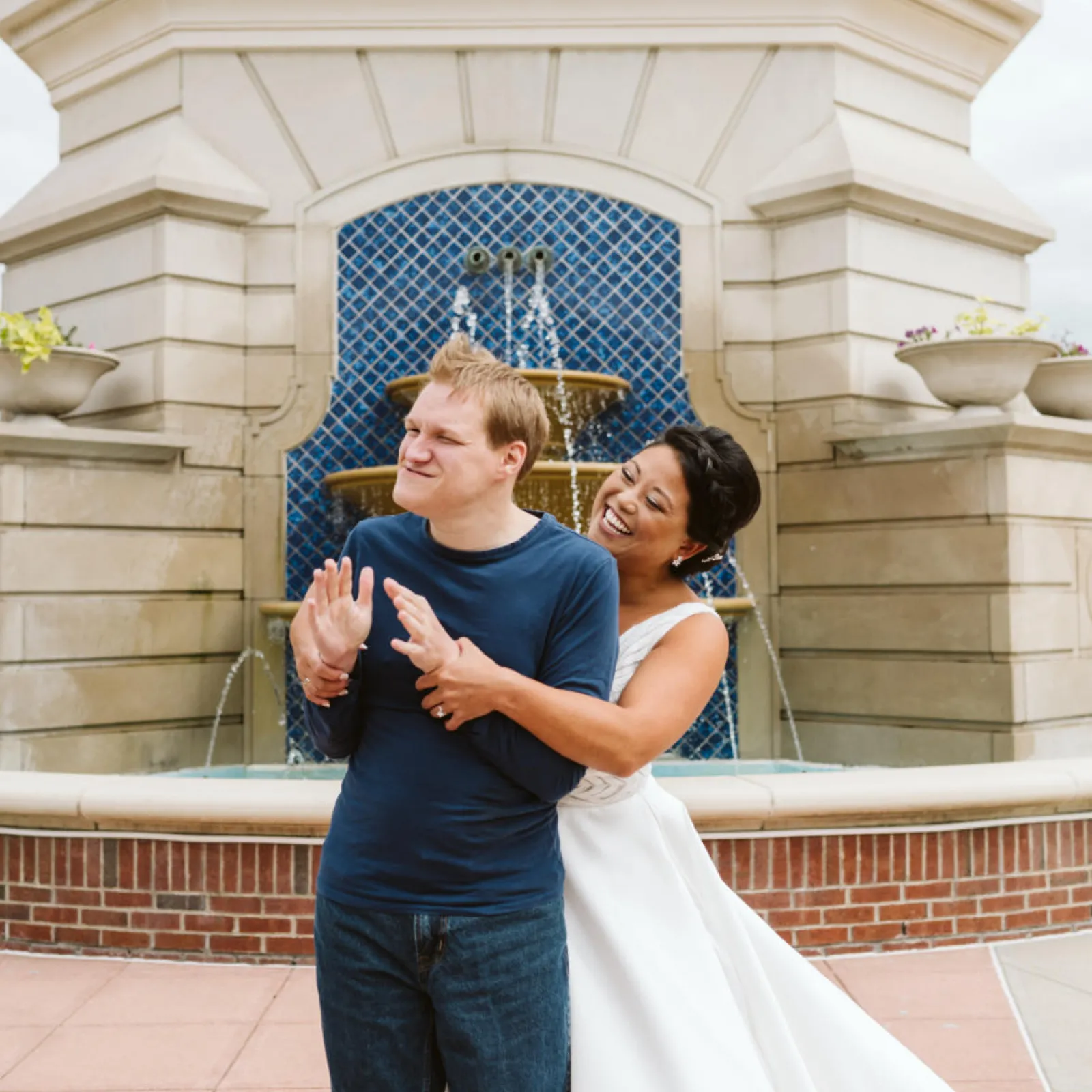 Two individuals hugging