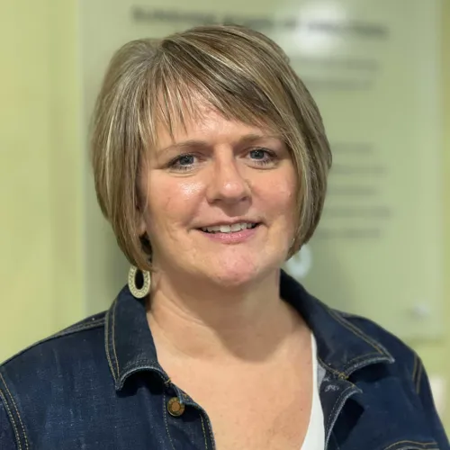 Jill Biedenharm smiles for a headshot.