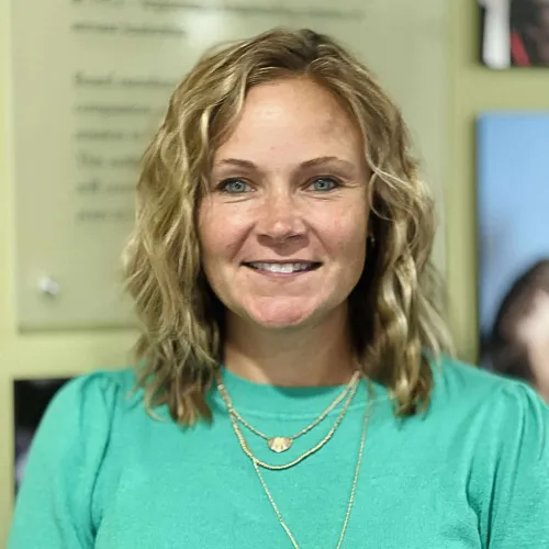 Shari Beck smiles for a headshot.